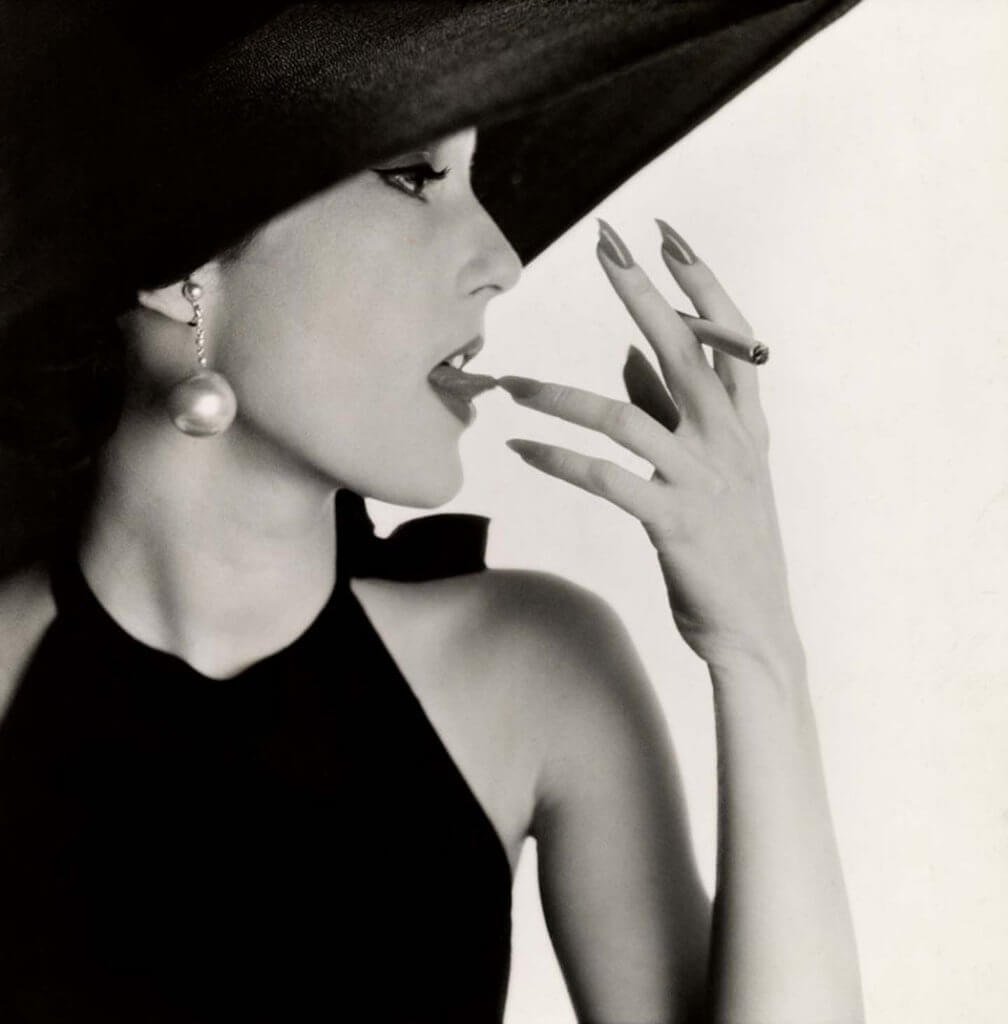 Girl with Tobacco on Tongue (Mary Jane Russell), New York, 1951 © Condé Nast 